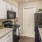 a kitchen with white cabinets